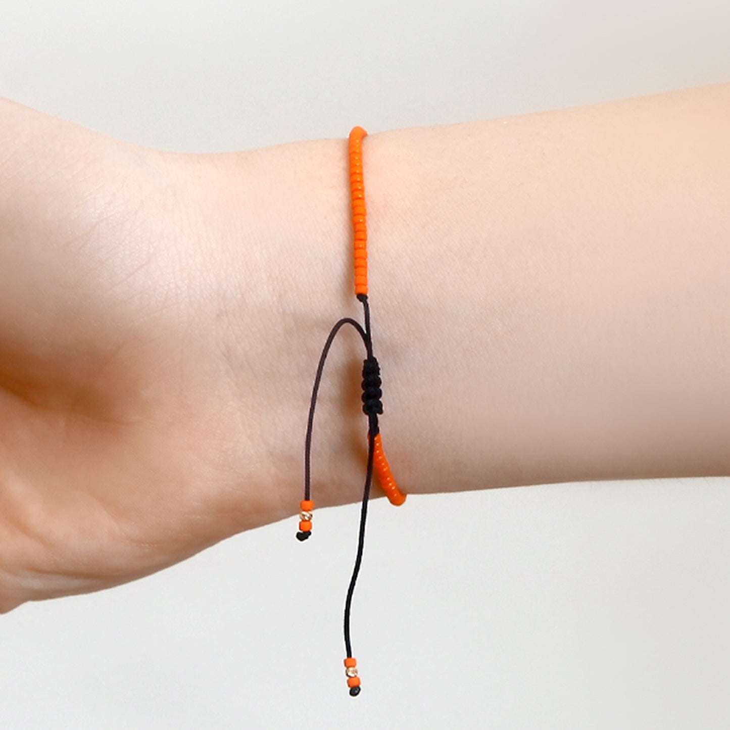 Orange String Bracelet with 14K Solid Gold Balls