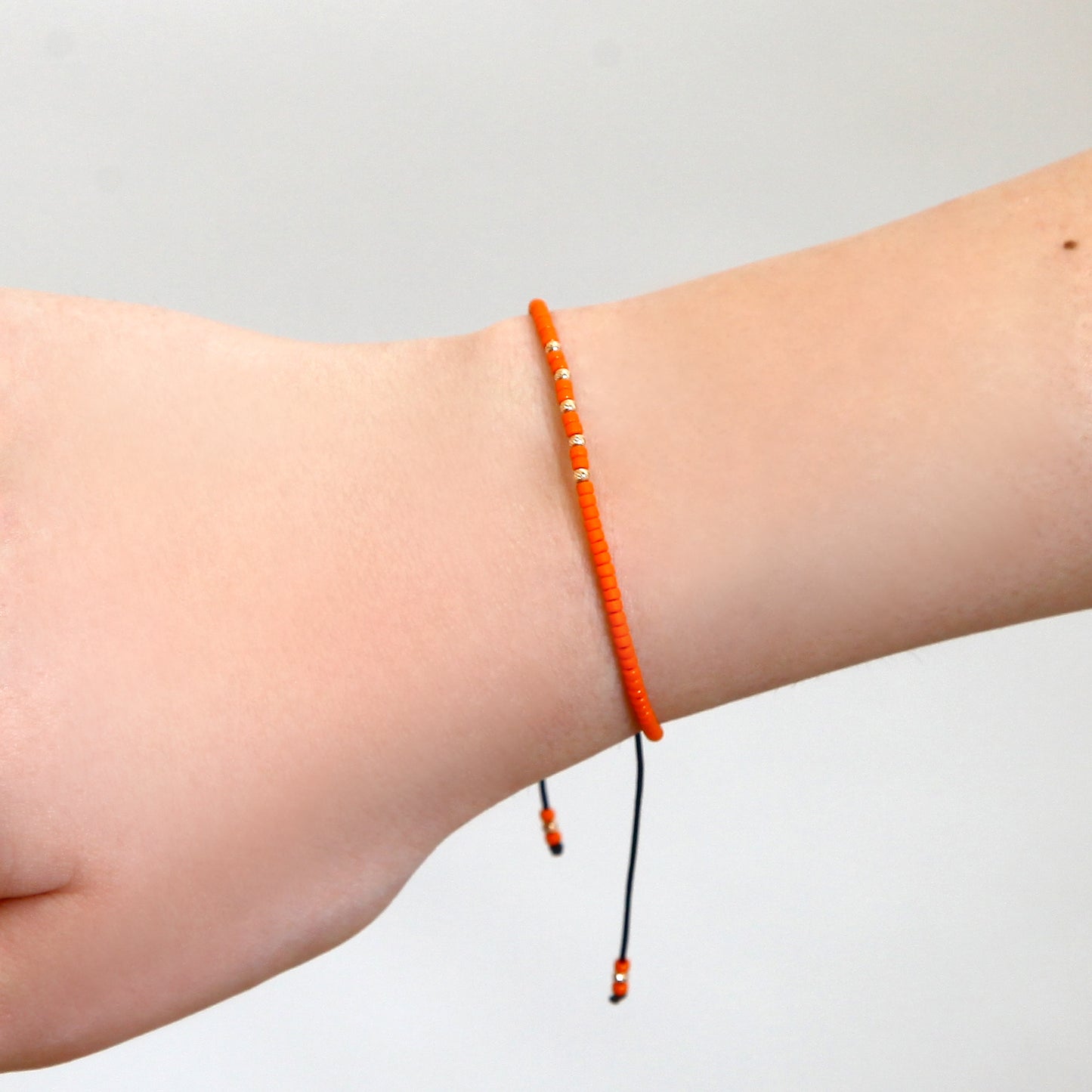 Orange String Bracelet with 14K Solid Gold Balls